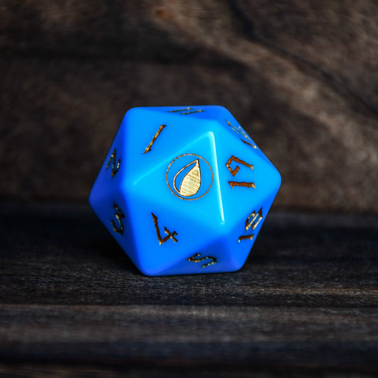 Blue polyhedral dice with gold numbering on a dark textured surface